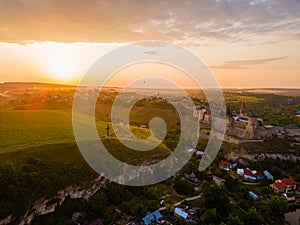 Aerial drone view of a medieval castle among the hills in summer