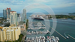 Aerial Drone view Miami Marine. Tropical paradise in Biscayne Bay. Marina with yachts and boats. Miami Marine port in