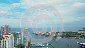 Aerial Drone view Miami Marine. Tropical paradise in Biscayne Bay. Marina with yachts and boats. Miami Marine port in