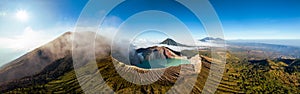 Aerial drone view of mount Kawah Ijen volcano crater at sunrise, East Java, Indonesia