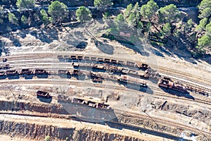 Aerial drone view of an old and rusty remains of the old copper mining exploitation