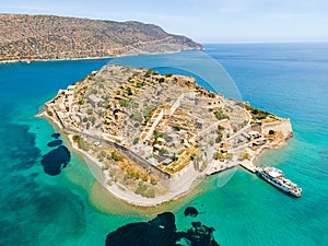 Aerial drone view of an old Venetian fortress island and former Leper colony. Spinalonga, Crete, Greece