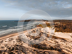 Aerial Drone view One Mile Beach during sunrise sunset with sand dunes. Forster, Great Lakes, Australia photo