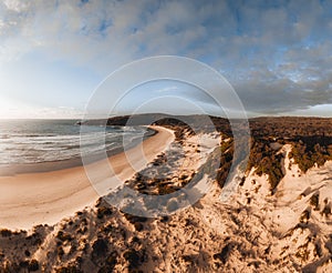 Aerial Drone view One Mile Beach during sunrise sunset with sand dunes. Forster, Great Lakes, Australia