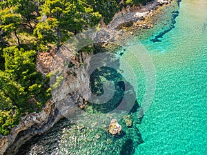 Aerial drone view over Chrisi Milia beach and the rocky surrounded area in Alonnisos island, Sporades, Greece