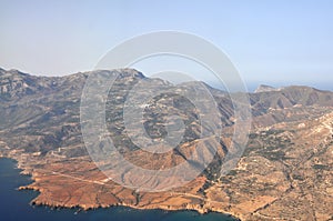 Aerial or drone view over dry landscape of greek island Karpathos, Cyclades