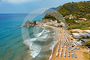 Aerial drone view over western coast and Glyfada beach, Island of Corfu, Greece. Glyfada Beach at Corfu Greece during the day