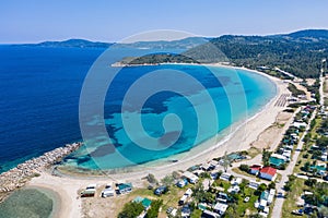 Aerial drone view of Paliouri Beach in Kassandra Sithonia penisula Chalkidiki Greece