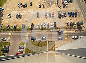 Aerial drone view parking lot with many cars
