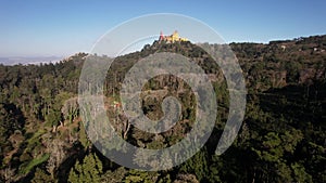 Aerial drone view of Pena Palace, a romanticist castle in the Sintra mountains of Portugal 25km west of Lisbon