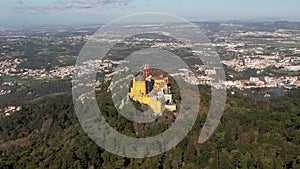 Aerial drone view of Pena Palace, a romanticist castle in the Sintra mountains of Portugal 25km west of Lisbon