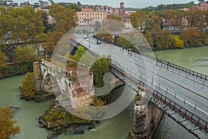 Aerial drone view of ponte emilio or ponte rotto, oldest bridge in the city of Rome. Visible remains of formerly great bridge, one photo
