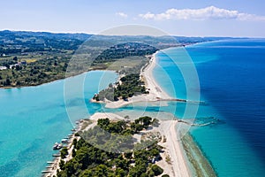 Aerial drone view of Port Glarokavos and lagoon beach in Kassandra penisula Chalkidiki Greece