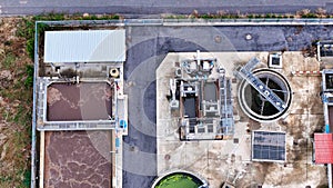 aerial drone view process cleaning dirty sewage water by active sludge Modern technologies wastewater treatment plant