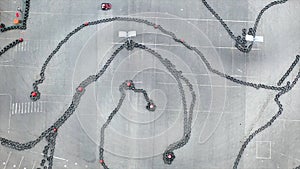 Aerial drone view on racing go-kart track, motorsport concept. Media. Sportsmen participating in the competition race