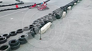 Aerial drone view on racing go-kart track, motorsport concept. Media. Sportsmen participating in the competition race