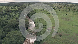 Aerial drone view of river in African landscape in Laikipia,