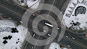 Aerial drone view of road junction, large car interchange. Aerial highway junction at winter evening, Colorcorrected 4k