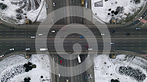 Aerial drone view of road junction, large car interchange. Aerial highway junction at winter evening, Colorcorrected 4k