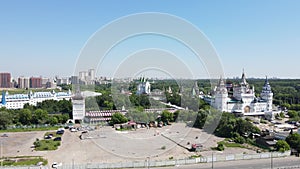 Aerial drone view of road with moving cars and platform for learning to drive car and motorcycle in Moscow near
