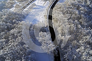 Aerial drone view with rural road in winter