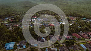 Aerial drone view of rural settlement in Felda Air Tawar 4, Kota Tinggi, Johor, Malaysia