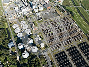 Aerial drone view of a sewage treatment plant, industrial installation for the cleaning and purifying of water. Circle