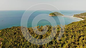 Aerial drone view small Koh Ma island, Ko Phangan Thailand. Exotic coast panoramic landscape, Mae Haad beach, summer day. Sandy