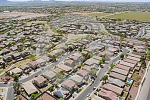 Aerial drone view of small town on desert residential area of a neighborhood with Avondale town Arizona US photo