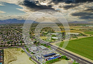 Aerial drone view of small town near mountains area a residential neighborhood with Avondale town Arizona US photo