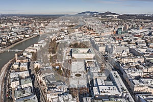 Aerial drone view of snowy Mirabelle Palace in Salzburg downtown