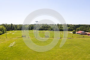 Aerial/Drone view of soccer/football field complex during the afternoon in Ontario, Canada.