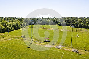 Aerial/Drone view of soccer/football field complex during the afternoon in Ontario, Canada.