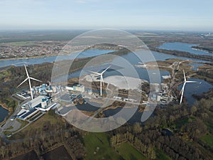 Aerial drone view on solar panels on water. Quarry and sand extraction. Sustainable innovations.