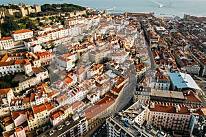 Aerial drone view of St. George Castle in Lisbon, Portugal with surrounding cityscape