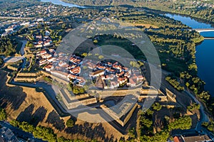 aerial drone view at sunrise of the fortified city of ValenÃ§a do Minho, Portugal