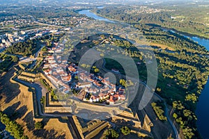aerial drone view at sunrise of the fortified city of ValenÃ§a do Minho, Portugal