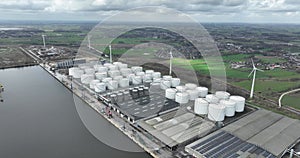 Aerial drone view of a tank terminal in Ghent, Belgium, focusing on the storage, distribution, and handling of dry and