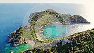 Aerial drone view to Porto Timoni paradise beach with clear azure sea water. Tropical island. Amazing european seascape.