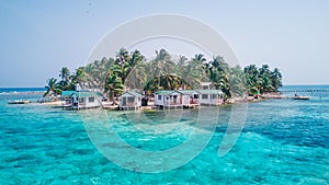 Aerial drone view of Tobacco Caye small Caribbean island in Belize Barrier Reef photo