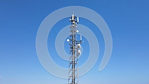 Aerial drone view of tower antennas telecommunication cell phone