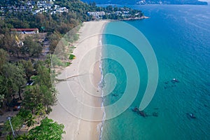 Aerial drone view of tropical empty Surin Beach in Phuket