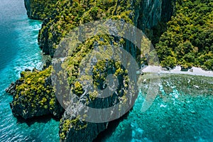 Aerial drone view of tropical island Entalula El Nido Palawan, Bacuit archipelago Philippines. Karst limestone rocky