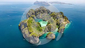 Aerial drone view of tropical Ko Phi Phi island, beaches and boats in blue clear Andaman sea water from above