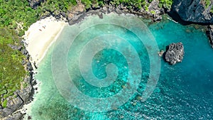 Aerial drone view of tropical Ko Phi Phi island, beaches and boats in blue clear Andaman sea water from above, Thailand