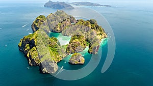 Aerial drone view of tropical Ko Phi Phi island, beaches and boats in blue clear Andaman sea water from above, Thailand