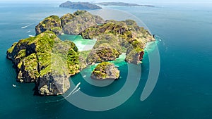 Aerial drone view of tropical Ko Phi Phi island, beaches and boats in blue clear Andaman sea water from above, Thailand