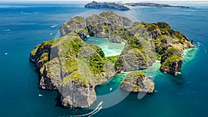 Aerial drone view of tropical Ko Phi Phi island, beaches and boats in blue clear Andaman sea water from above, Thailand photo