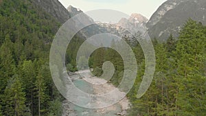 Aerial drone view of a turquoise Soca river in Julian Alps near Trigolov national park, Slovenia at dusk