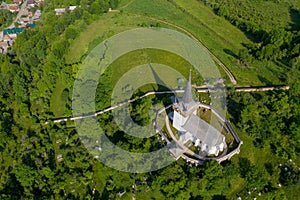 Aerial drone view of Valeni reformed church, Transylvania, Romania